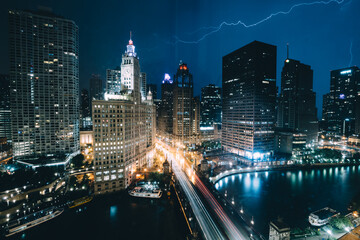 Chicago Thunderstorm lightning strike night river buildings 