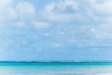 View from Luquillo beach in tropical Puerto Rico and white puffy clouds
