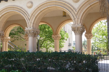 decorative limestone arches creating a covered walkway
