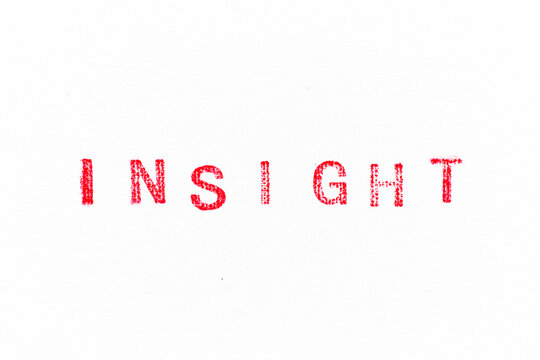 Red color rubber stamp in word insight on white paper background