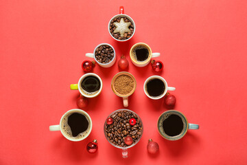 Christmas tree made of cups with coffee, beans and Christmas decor on color background