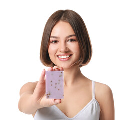 Beautiful young woman with soap on white background