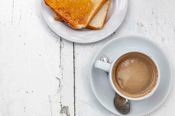 Breakfast set, hot coffee, toast and pineapple jam