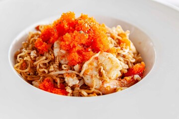 A plate of instant noodles stir-fried with fresh shrimp and ebiko