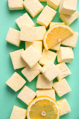 Tasty sweet marshmallows on color background