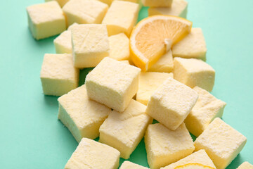 Tasty sweet marshmallows on color background