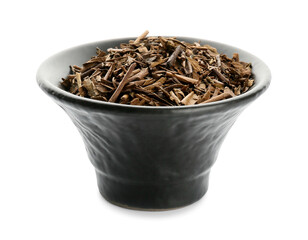 Bowl of dry hojicha green tea on white background