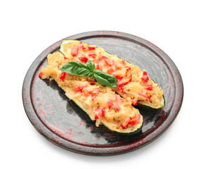 Plate with quinoa stuffed zucchini boats on white background