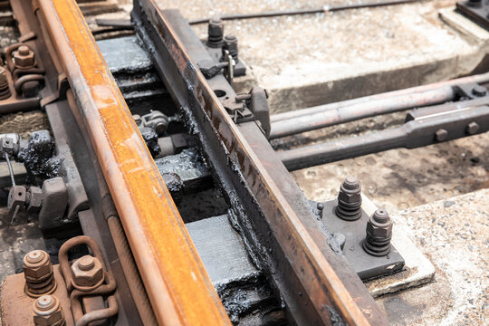 Close Up Rail Tracks With  Grease Make It Flow Smoothly