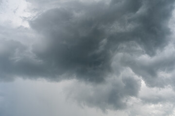 Fototapeta na wymiar Dark and ominous Cumulonimbus Clouds just before they begin their down pour of rain.