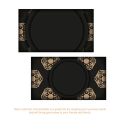 Business card template in black with light brown vintage ornament