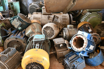 Old disassembled electric motor in a warehouse for repair.