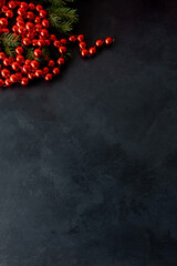 Christmas background. Festive ornament. Greeting card. New Year postcard. Red bead garland green...