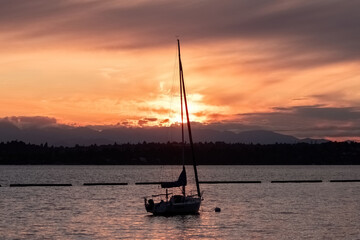 single boat floating out in the puget sound