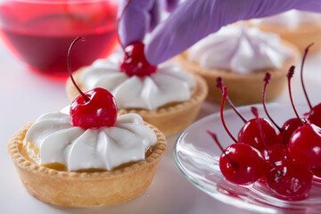 cake with a cocktail cherry