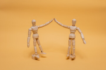 Prototype for drawing standing, raising two hands to greet each other in the background.