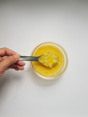 sweet corn soup made by mung bean, corn slices, sticky rice.