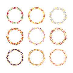 Set of fall wreathes. Collection of autumn circle frames made of autumn leaves, herbs, berries, flowers and vegetables isolated on white background. Can be used for invitations, greeting cards ets.