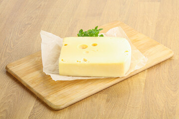 Maasdam cheese over the board