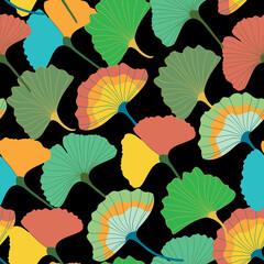 Colorful ginkgo leaves seamless vector pattern on black background