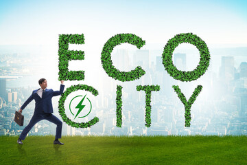 Eco city in ecology concept with businessman