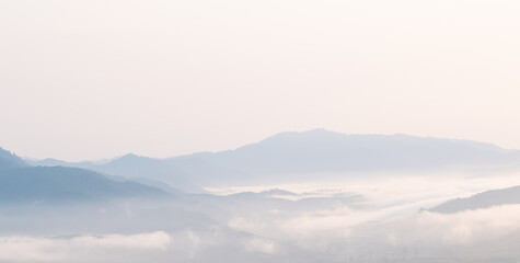 Surreal landscape of morning foggy..Morning clouds at sunrise.Landscape of fog and mountains of northern Thailand.