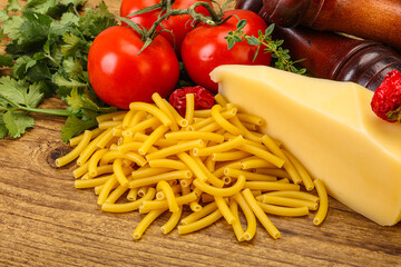 Italian pasta raw Maccheroni for cooking