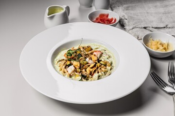 Pasta with seafood. Traditional Italian spaghetti with shrimps, mussels and squid with a spicy sauce. Mediterranean Kitchen. Copy space
