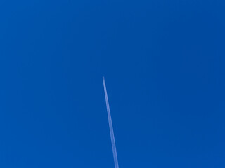airplane in the blue sky