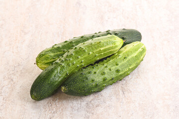 Fersh juicy green cucumbers heap