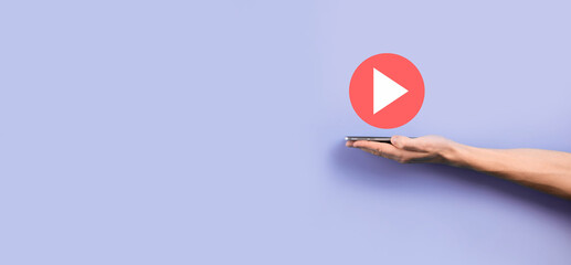 Businessman pressing, hold play button sign to start or initiate projects.Video Play Presentation. Idea for business, technology.media player button. Play icon.Go.