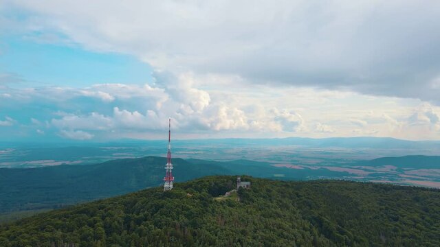 Drone flight over mountain village with forests. Sleza mountain near Wroclaw in Poland. Nature background, aerial view
