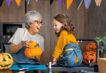 Happy family preparing for Halloween.