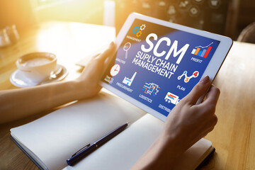 SCM - Supply Chain Management and business strategy concept on the screen.