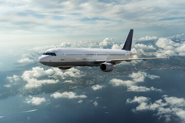 Fototapeta na wymiar Flugzeug über den Wolken
