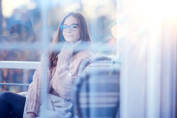 young girl in cafe, youth, lifestyle concept girl with glasses looking