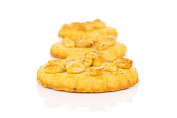 Group of three whole delicious cookie with peanuts in row on white background