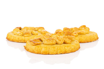 Group of three whole delicious cookie with peanuts in one group on white background