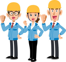 建設現場で働く青い作業着の男女3人のチーム
