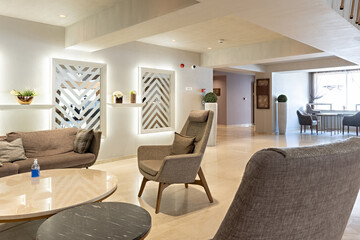 Interior of a modern hotel lounge with furniture