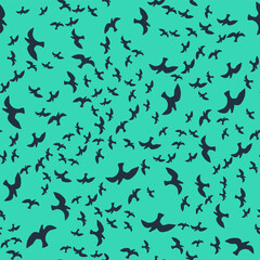 Black Bird seagull icon isolated seamless pattern on green background. Vector