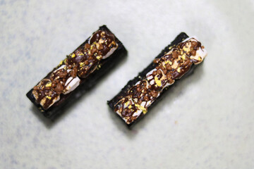 luxury hand made Micheline French modern Chocolate Ecstacy Bar dessert on white black background