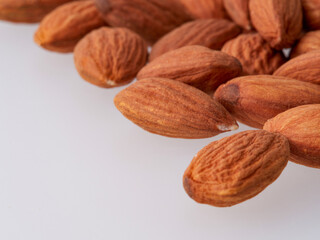 a group of almonds isolated on white
