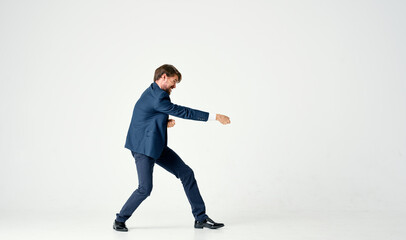 bearded business man emotions successful light background