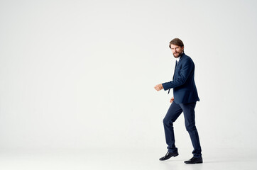 a man in a jacket and tie movement Jump office Studio