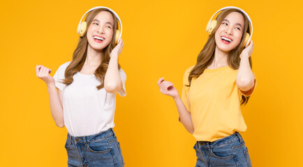 Cheerful young Asian woman in headphones listening to music and enjoy favourite playlist application with dancing on orange background.