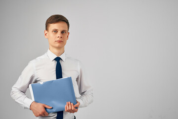 manager in shirt with tie documents professional office studio