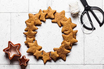 Star-shaped gingerbread cookies wreath, copy space.