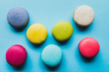 Fototapeta na wymiar Macaron cookies, top view, almond biscuits, colorful, tasty.