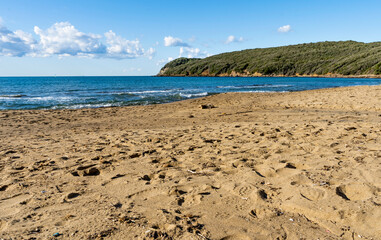 The sandy beach of the Gulf of Baratti, in the municipality of Piombino, along the Etruscan Coast, province of Livorno, Tuscany, Italy